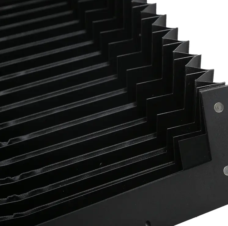 Side detail of arch shaped accordion bellow cover, custom bow machine cover

