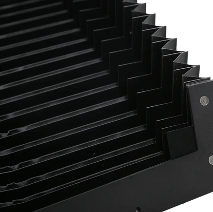 Side detail of arch shaped accordion bellow cover, custom bow machine cover
