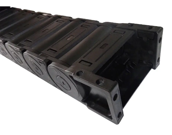 End detail of full black enclosed drag chain, black plastic drag chain