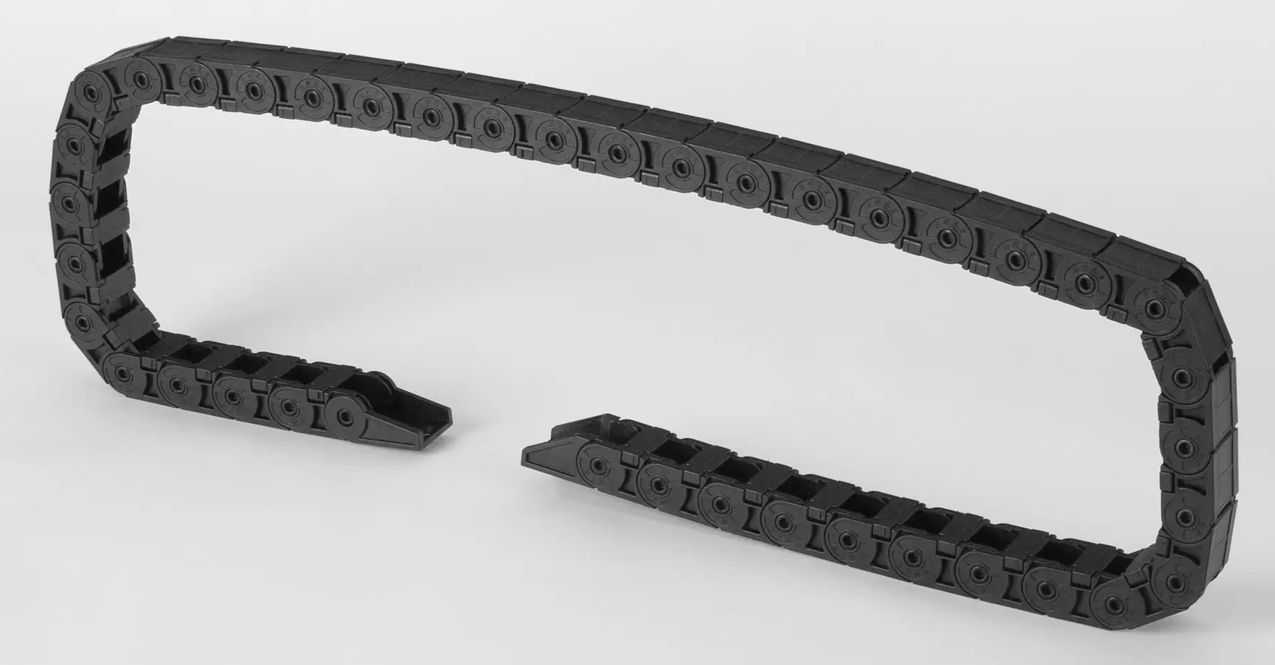 End detail of mini black plastic drag chain, small size drag chain end
